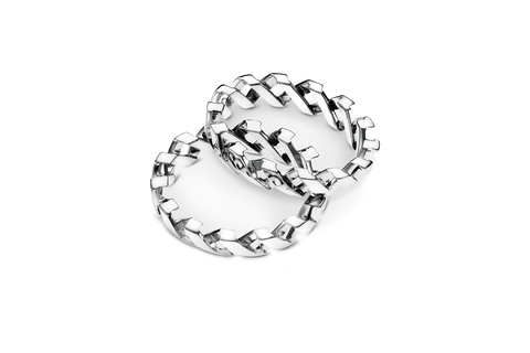 thumbnail Exquisite sterling silver chevron stacking rings designed by Christian Tse and 3D printed on the Desktop Metal Production System P-1. The Production System now offers jewelry and luxury goods manufacturers the fastest way to directly 3D print high-quality sterling silver jewelry, watches, belt buckles, and decorative hardware for handbags. (Photo: Business Wire)