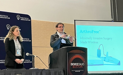 Lazurite President Leah Brownlee and CEO Eugene Malinskiy present the first-in-class, FDA-cleared ArthroFree Wireless Surgical Camera at a recent MedTech Innovator event in Boston. (Photo: Business Wire)