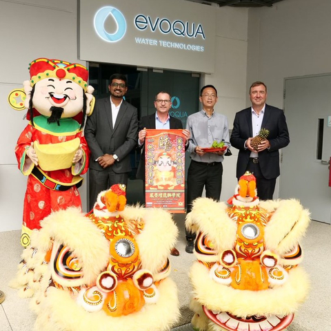 original Ron Keating, Evoqua's Chief Executive Officer (right), was joined by Govindan Alagappan, Evoqua's VP and Managing Director for APAC (left), Hervé Fages, Evoqua's Executive Vice President and Applied Product Technologies Segment President (center left), and Keng Hoo Yeo, Operations Director for Evoqua (center right). (Photo: Business Wire)