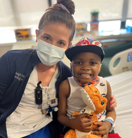 Cohen Children’s Medical Center nurse Ashleigh Martin enjoys a fun moment with a young patient. Credit Northwell Health