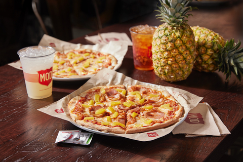 On National Pineapple Day on June 27, any pizza topped with pineapple is free at select MOD locations. MOD is also offering a nationwide special $7 classic Hawaiian pizza for online and in-app purchases. (Photo: Business Wire)