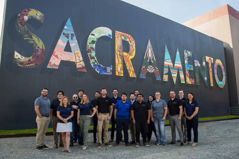 Picture of the e-Mission Control team in front of the Sacramento mural on CSUS campus. (Photo: Business Wire)