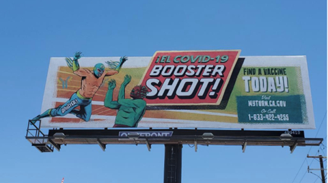 California Department of Public Health uses culturally relevant characters such as luchadores to encourage vaccines and boosters among California’s Latino Community, as seen on this billboard. (Photo: Business Wire)