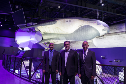 (From left to right): Neeraj Gupta, SVP & GM, Space Destinations at Sierra Space, Serdar Hüseyin Yıldırım, President of the Turkish Space Agency and Cem Ugur, Director General for ESEN visit Sierra Space's Dream Chaser spaceplane exhibit at the Kennedy Space Center's new Gateway Building. (Photo: Business Wire)