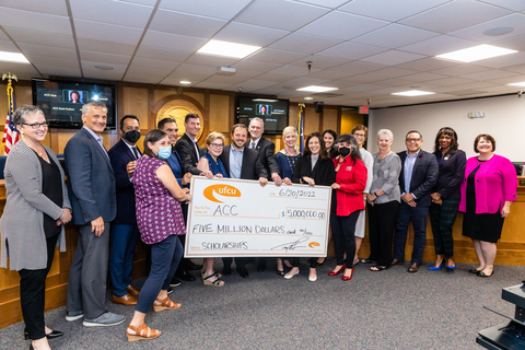 UFCU board members and executives join ACC board members and executives for a check presentation at the ACC Board of Trustees meeting. (Photo: Business Wire)