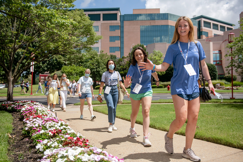 A group of Tri Delta sisters waving to the camera on their tour of the St. Jude campus on day two of the Tri Delta Celebration 2022. (Photo: ALSAC/St. Jude Children’s Research Hospital)
