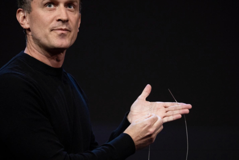 Synchron CEO Thomas Oxley holding the Stentrode™ Endovascular Electrode Array during TED 2022. Photographer: Ryan Lash