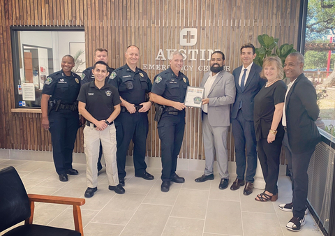 Austin Police Department at ribbon cutting event with Dr. Sandeepkumar Singh (CEO Austin Emergency Center), Taseer Badar (Chairman and CEO of ZT Corporate), Michelle Tribble (COO Austin Emergency Center) and Kraig Killough (President Altus Community Health). (Photo: Business Wire)