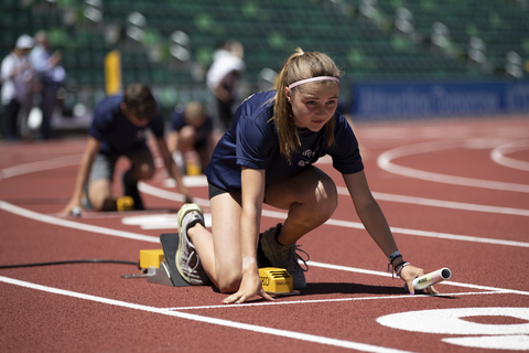 thumbnail Young participants were guided through their preparations for a 4x100m relay race. (Photo: Business Wire)


