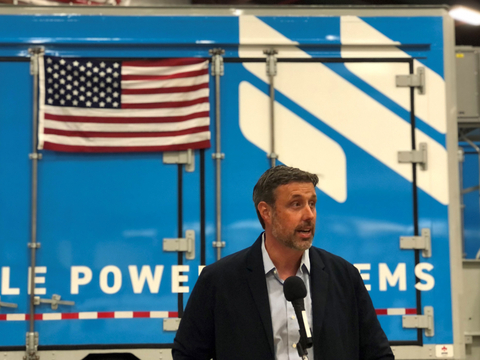 Jay Bellows, CEO of Nomad Transportable Power Systems, speaks Monday at a ribbon cutting for the mobile energy storage systems that promise to remove barriers to energy storage adoption. (Photo: Business Wire)