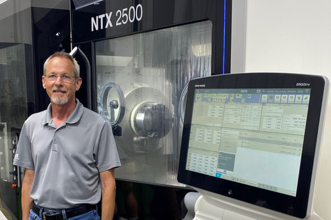 President Keith Felts with Advanced Machining's new multi-tasking CNC mill/turn machine (Photo: Business Wire)