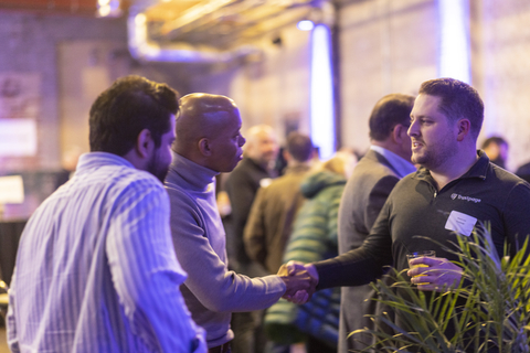Michigan Founders Fund Member Mykolas Rambus, Co-Founder and CEO of Hush, shakes hands with Chase Lee, Founder and CEO of Trustpage at an MFF event in March (Photo: Business Wire)