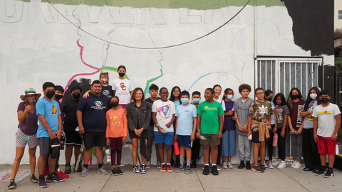 Forever 21 CEO Winnie Park and a group of local children get ready to paint a mural in Los Angeles through a partnership with Arts Bridging the Gap and Boys & Girls Clubs of America. (Photo: Business Wire)