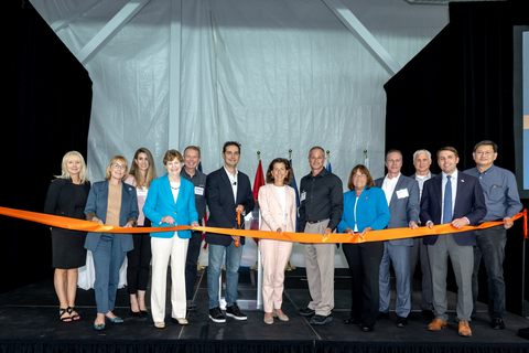 onsemi celebrated its newest silicon carbide production facility in Hudson, NH with a ribbon cutting ceremony. Attendees from left to right: Felicity Carson, SVP and CMO, onsemi; U.S. Sen. Maggie Hassan (NH); Catherine Côté, VP and Chief of Staff to the CEO, onsemi; U.S. Sen. Jeanne Shaheen (NH); Tobin Cookman, SVP of Human Resources, onsemi; Hassane El-Khoury, President, CEO and Director, onsemi; U.S. Secretary of Commerce Gina Raimondo; Joe Loiselle, VP of SiC Operations and GM of Hudson site, onsemi; U.S. Rep. Annie Kuster (NH-02); Simon Keeton, EVP and GM Power Solutions Group, onsemi; Thad Trent, EVP and CFO, onsemi; Rep. Chris Pappas (NH-01); Dr. Wei-Chung Wang, EVP of Global Manufacturing and Operations, onsemi. (Photo: Business Wire)