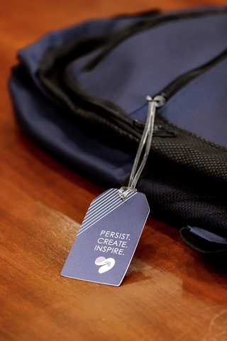 Name tags with a motivational tagline were added to all backpacks. (Photo: Business Wire)