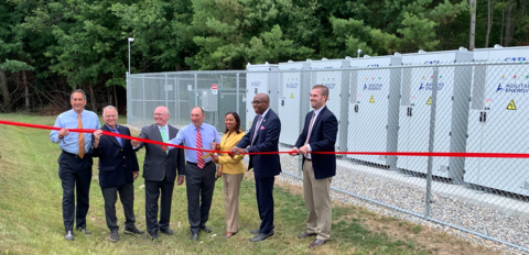 Rhode Island Lieutenant Governor Sabina Matos attended a ribbon-cutting ceremony today to celebrate an energy storage project in Pascoag, Rhode Island, reaching commercial operation. Developed with Agilitas Energy, the project will bring reliable and affordable clean energy to the Pascoag Utility District. Pictured (from left to right): Jeff Perry, Vice President of Asset Management, Agilitas Energy; Mike Kirkwood, General Manager and CEO, Pascoag Utility District; Jeffrey Diehl, CEO, Rhode Island Infrastructure Bank; Ken Rubin, Cofounder and Managing Partner, Agilitas Energy; Sabina Matos, Lieutenant Governor of Rhode Island; Dr. Christopher Abhulime, Deputy Chief of Staff, Rhode Island’s Office of the Governor; Chris Kearn, Interim OER Commissioner. (Photo: Business Wire)