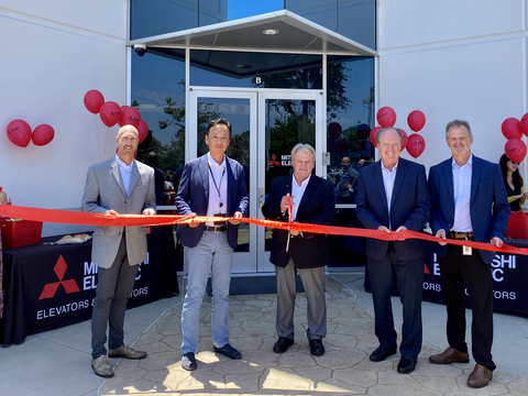Representatives of Mitsubishi Electric US, Inc. join in a ribbon cutting at the new Elevator and Escalator Division call center in Cypress, California. Pictured (left to right): Jared Baker, senior vice president, HR and administration, Mitsubishi Electric US, Inc.; Masahiro Oya, chairperson, Mitsubishi Electric US, Inc.; John Faure, senior director, service and labor relations department, Mitsubishi Electric US, Inc. Elevator and Escalator Division; Mike Corbo, president and CEO, Mitsubishi Electric US, Inc.; Erik Zommers, senior vice president and general manager, Mitsubishi Electric US, Inc. Elevator and Escalator Division (Photo: Business Wire)