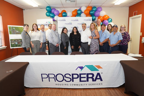 Congresswoman Mayra Flores, R-TX, (center in black) with members of the construction and development companies that will tear down the existing complex and reconstruct a new complex with the same name. (Photo: Business Wire)