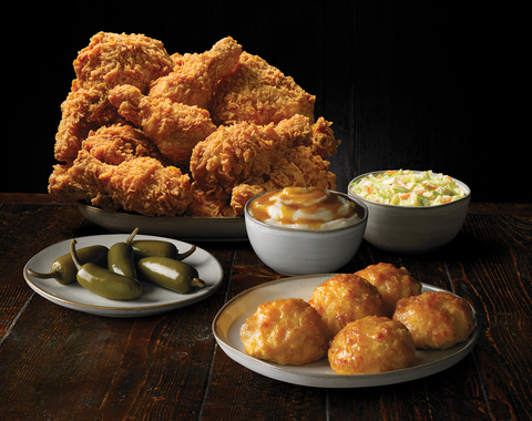 Feed the Family Feast includes a 10-piece leg and thigh assortment, two large sides, five Honey-Butter Biscuits™, and five Jalapeño peppers. (Photo: Business Wire)