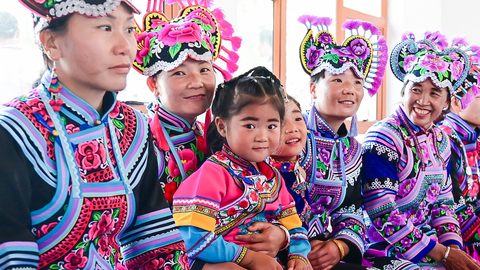 Women from the Art Ensemble “Huobonuoma,” or “Daughters of the Moon,” showcasing their Yi embroidered costumes, an ancient handcraft representing the cultural heritage of the Yi ethnic group. (Photo: Courtesy of Waipula Villagers)