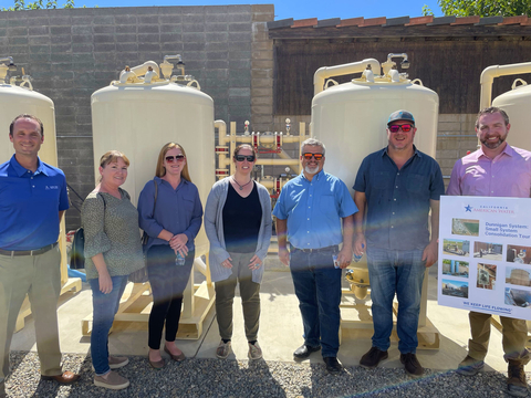 Staff from California American Water and Golden State Water tour a water system in Dunnigan, CA, with California Public Utilities Commissioner Darcie Houck (center).