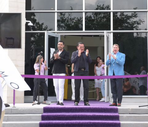 CEO Ray Urdaneta and Chairman Luis Urdaneta, the co-founders of MONAT Global Corp., and President Stuart MacMillan celebrate the opening of MONAT's new Doral campus. (Photo: Business Wire)