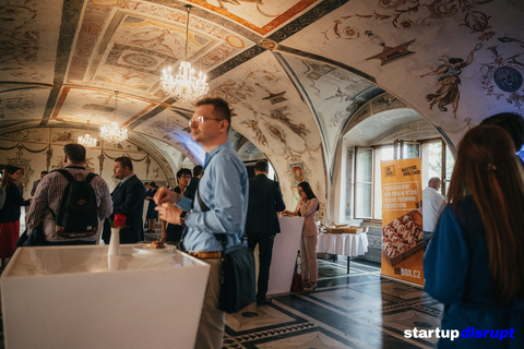 Attendees mingling at the historic Martinic Palace in Prague, Czech Republic during the Sustainable Future Conference. (Photo Credit: Startup Disrupt)