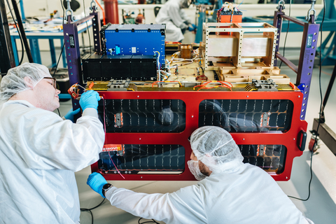 original Momentus team working on the Vigoride orbital transfer vehicle. Photo credit: Niall David