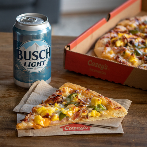 Casey’s guests can enjoy its handmade breakfast pizza with a twist: Busch Light beer cheese sauce (Photo: Business Wire)