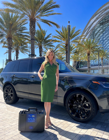 original Redline CMO Alex Parker with new Battery + Coolant Leak Detector for Jaguar Land Rover. (Photo: Business Wire)
