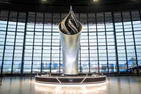 The finished Al Davis Memorial Torch stands 93 feet tall and is the largest free-standing, 3D-printed structure in the world. The reinforced polycarbonate substructure is finished with 1,148 machined aluminum façade panels giving the structure it’s polished silver appearance. (Photo: Business Wire)