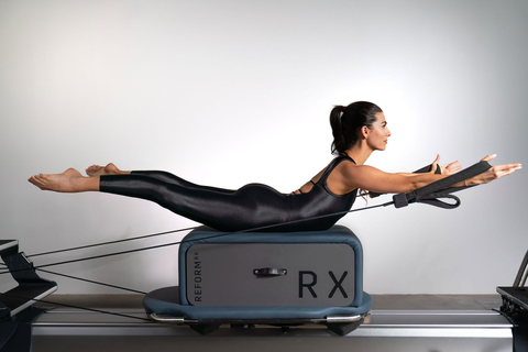 Ready, Set, RX: Reformer Pilates instructor Kourtney McCullough, one of the founding trainers, pictured on Reform RX, the commercial grade, digitally connected Pilates reformer. Visit reformrx.com for more information. (Photo: Business Wire)