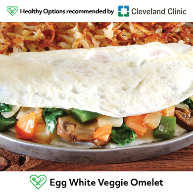 Egg White Veggie Omelet menu option; tagged with symbol to help guests identify healthy options (Photo: Business Wire)