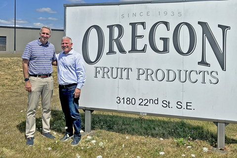 Joe Prewett (left) and Chris Sarles (right) stand outside Oregon Fruit Products headquarters in Salem, Oregon. (Photo: Business Wire)