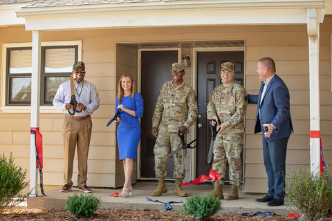 Pictured from left to right: Romeo Montez, Fort Sill housing chief, Amber McNeil, Fort Sill operations director at Corvias, Specialist Timothy Harper, Col. James H. B. Peay IV, United States Army Garrison Fort Sill commander, and Pete Sims, managing director at Corvias welcomed the Harper family to their newly renovated 2,500 square foot, five-bedroom, single family home marking 15 years of success with the Military Housing Privatization Initiative at Fort Sill. (Photo: Business Wire)