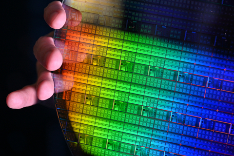 A photo shows Intel's fully processed 30-millimeter silicon spin qubit wafer. (Credit: Intel Corporation)