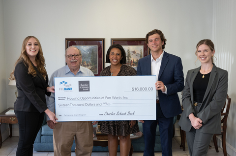 Representatives from Charles Schwab Bank and the Federal Home Loan Bank of Dallas awarded $16,000 in grants to Fort Worth, Texas, nonprofit HOFW Inc. The organization provides homebuyer education. (Photo: Business Wire)