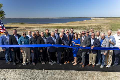 North Texas Municipal Water District Board Members and speakers cut the ribbon at the Bois D’Arc Lake Dedication. While the lake is not yet open to the public, this ceremony commemorated the conclusion of construction on the state’s newest major reservoir and its associated operations facilities (Photo: Business Wire)