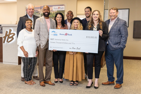 Representatives from Home Bank and the Federal Home Loan Bank of Dallas awarded $16,000 in Partnership Grant Program funding to Home by Hand, a home revitalization nonprofit in Metairie, Louisiana. (Photo: Business Wire)