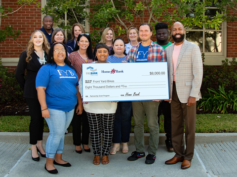 Representatives from Home Bank and the Federal Home Loan Bank of Dallas awarded $8,000 in grants to Front Yard Bikes, a youth workforce development nonprofit in Baton Rouge, Louisiana. (Photo: Business Wire)