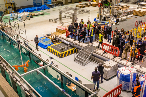 Gazelle Wind Power team members, media, and wind industry participants gather to witness Gazelle's platform subjected to basin model testing in Spain.  (Photo: Gazelle Wind Power)