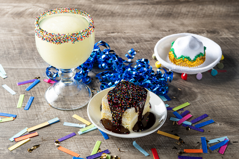 original On The Border's 40th birthday limited time only menu features the new Birthday ‘Rita, a Grande frozen house margarita blended with a hint of birthday cake, rimmed with confetti and sprinkles; and Birthday Cake, On The Border’s new Tres Leches Cake covered in decadent Mexican chocolate and confetti sprinkles. (Photo: Business Wire)