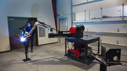 At FABTECH 2022, Universal Robots will showcase new cobot-powered metal fabricating solutions such as the new Park’N’Arc feature from Vectis Automation that enables the cobot welder to handle longer parts. (Photo: Business Wire)