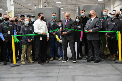 U.S. Senator Tom Carper, center, attends the inauguration of Bloom Energy's high-volume electrolyzer production line in Newark, Del. Tuesday alongside company executives and manufacturers. (Photo: Business Wire)