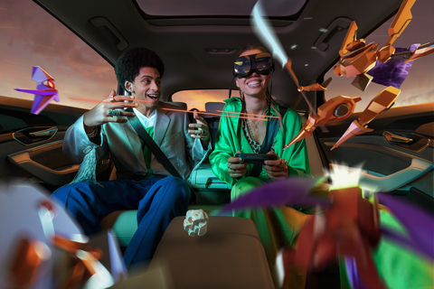 An automobile passenger enjoying the holoride experience. Featuring art from holoride's flagship launch game, Cloudbreakers: Leaving Haven. (Graphic: Business Wire)