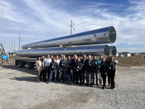 OPPD and Valmont employees in front of project products (Photo: Business Wire)