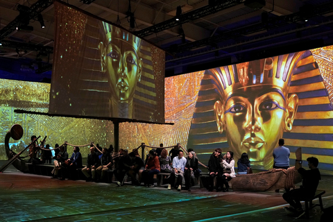 A crowd gathered for a special midnight viewing of Beyond King Tut: The Immersive Experience at Pier 36 in New York City on Nov, 4, 2022, commemorating the 100th anniversary of King Tut’s tomb being discovered. The new exhibition created in partnership with the National Geographic Society is now open for a limited run in New York City, Los Angeles, Washington D.C. and Vancouver, with San Diego and more cities coming in 2023. Credit: Charles Sykes