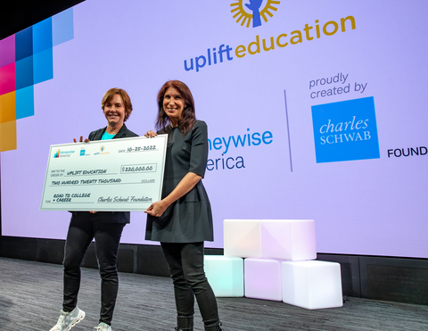 Carrie Schwab-Pomerantz presents check for $220,000 to Yasmin Bhatia, CEO of Uplift Education (Photo: Business Wire)