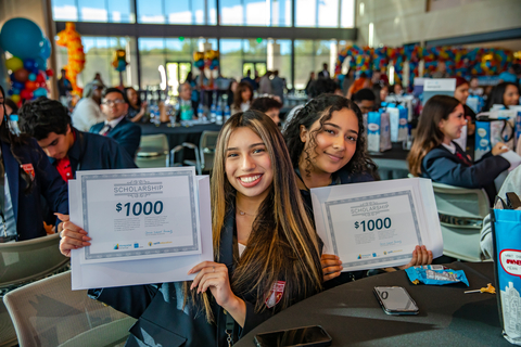 Uplift Education students with scholarship certificates (Photo: Business Wire)