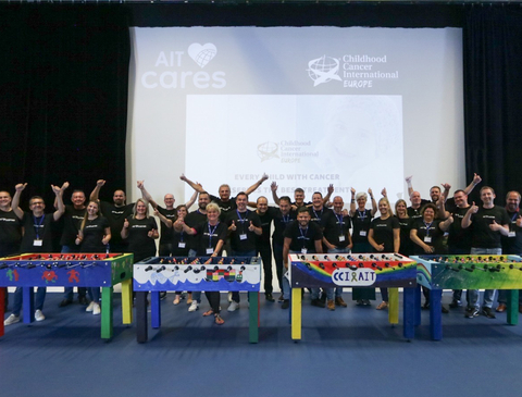 original Teammates at AIT's European regional leadership meeting celebrate the completion of their kick-off project to support CCI Europe. (Photo: Business Wire)